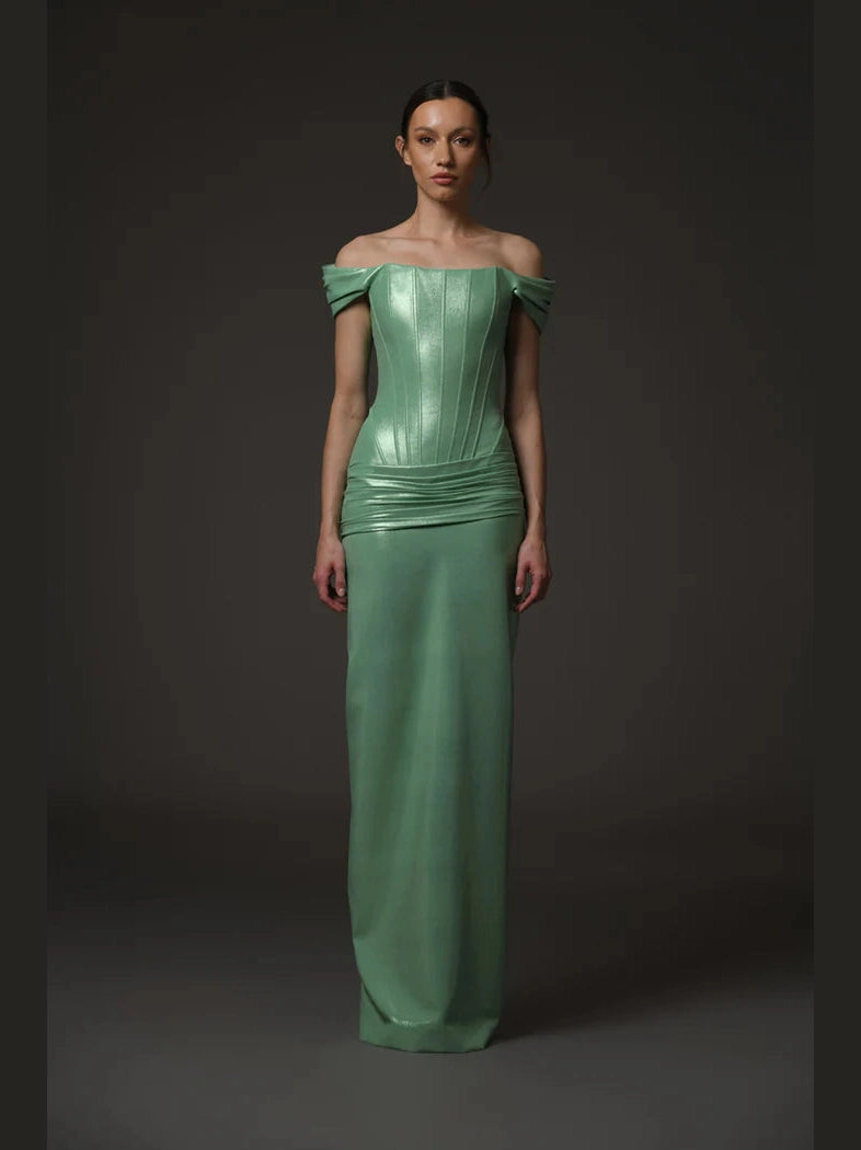 Green corseted dress.