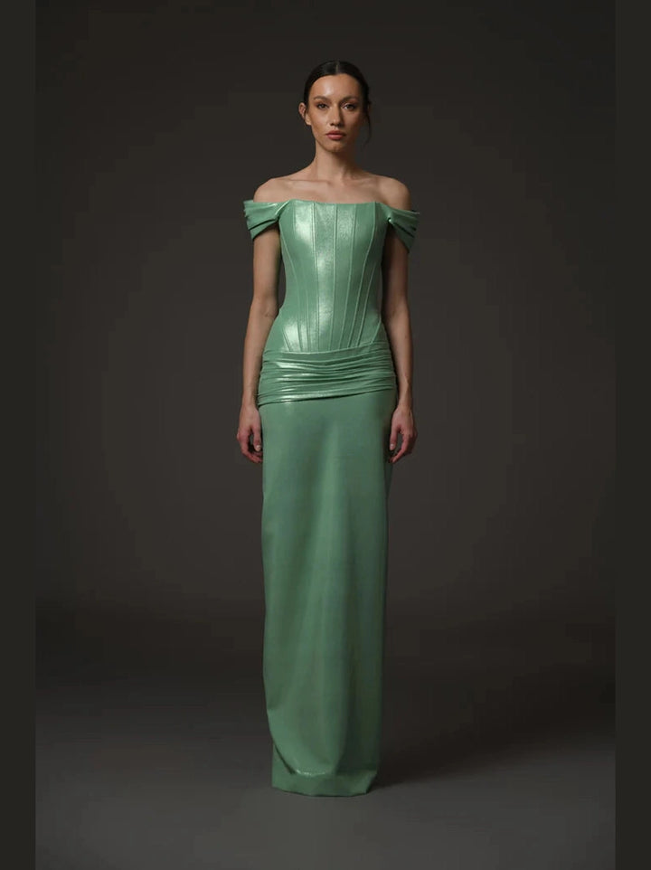 Green corseted dress.