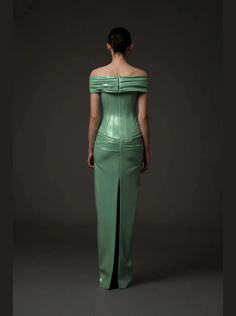 Green corseted dress.