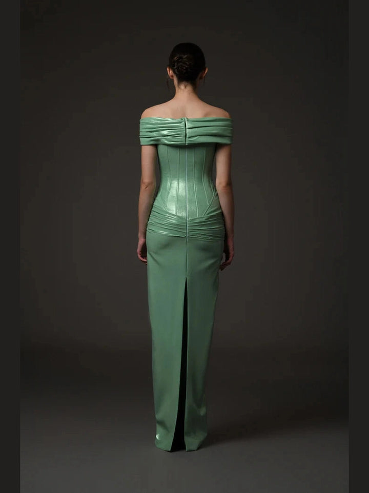 Green corseted dress.