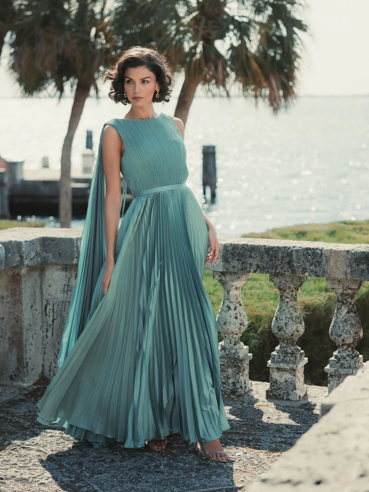 Sleeveless high neck cape back heat pleated gown