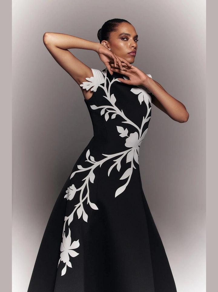 NEOPRENE
DRESS WITH LAZER CUT FLOWERS