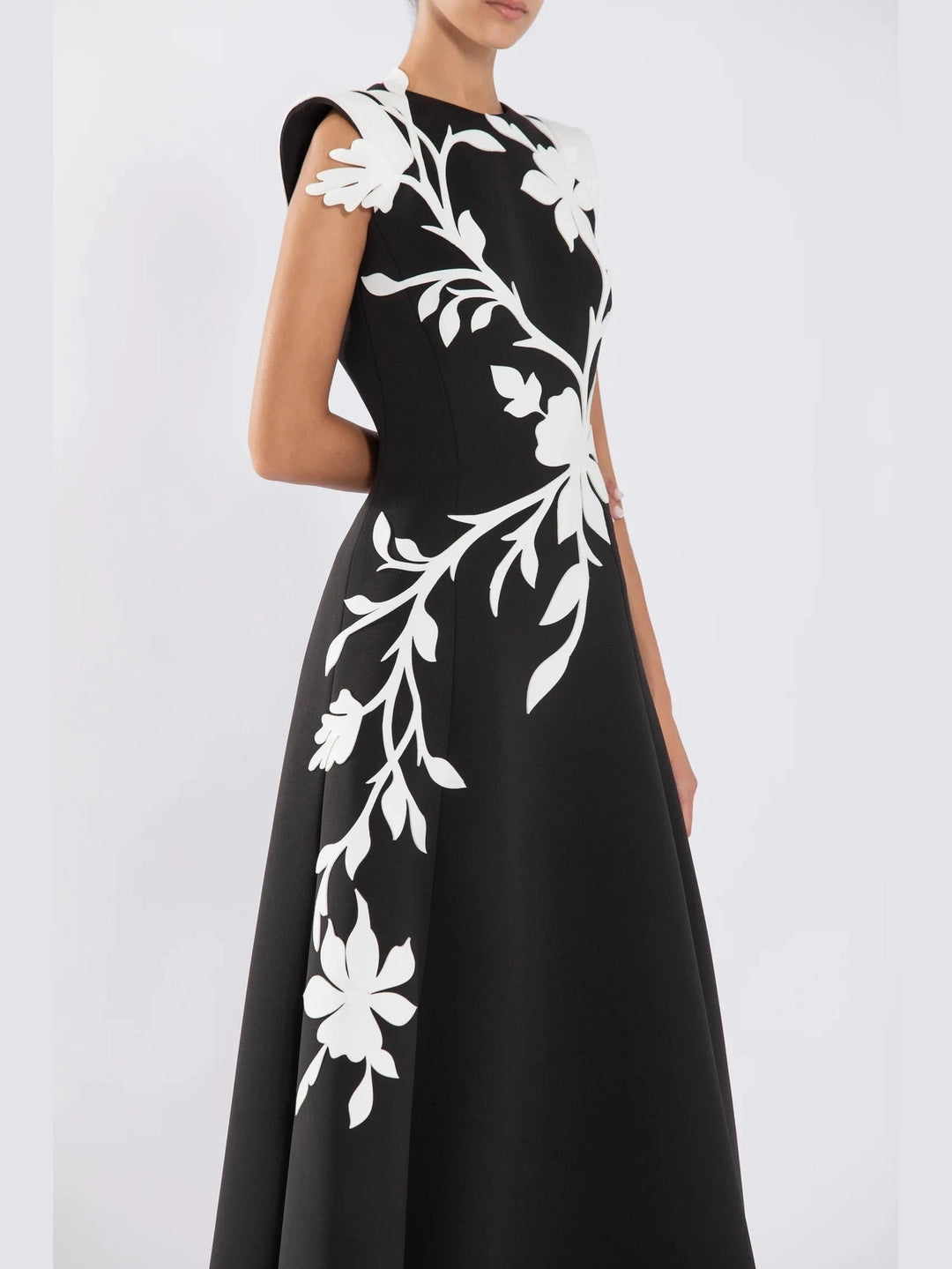 NEOPRENE
DRESS WITH LAZER CUT FLOWERS